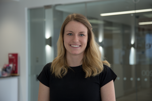 Woman with glass door background